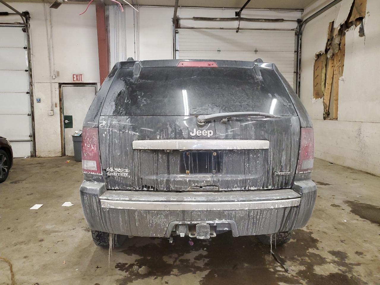 2010 Jeep Grand Cherokee VIN 1J4RR5GT8AC115188 Copart auction photo, front end damage thumbnail 6