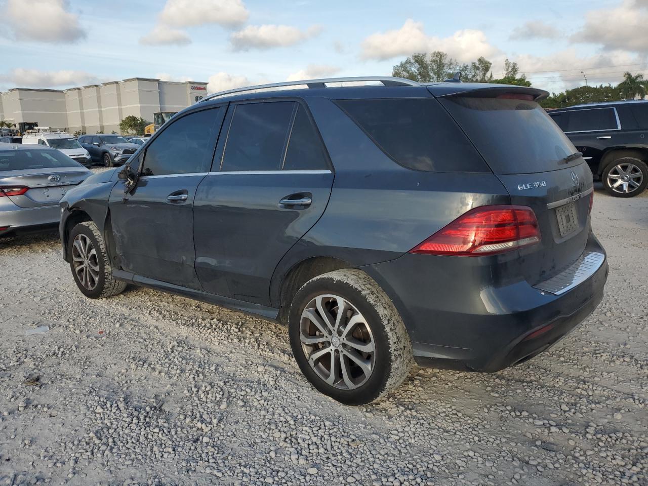 2016 Mercedes-Benz GLE VIN 4JGDA5JB0GA663855 Copart auction photo, side damage thumbnail 2