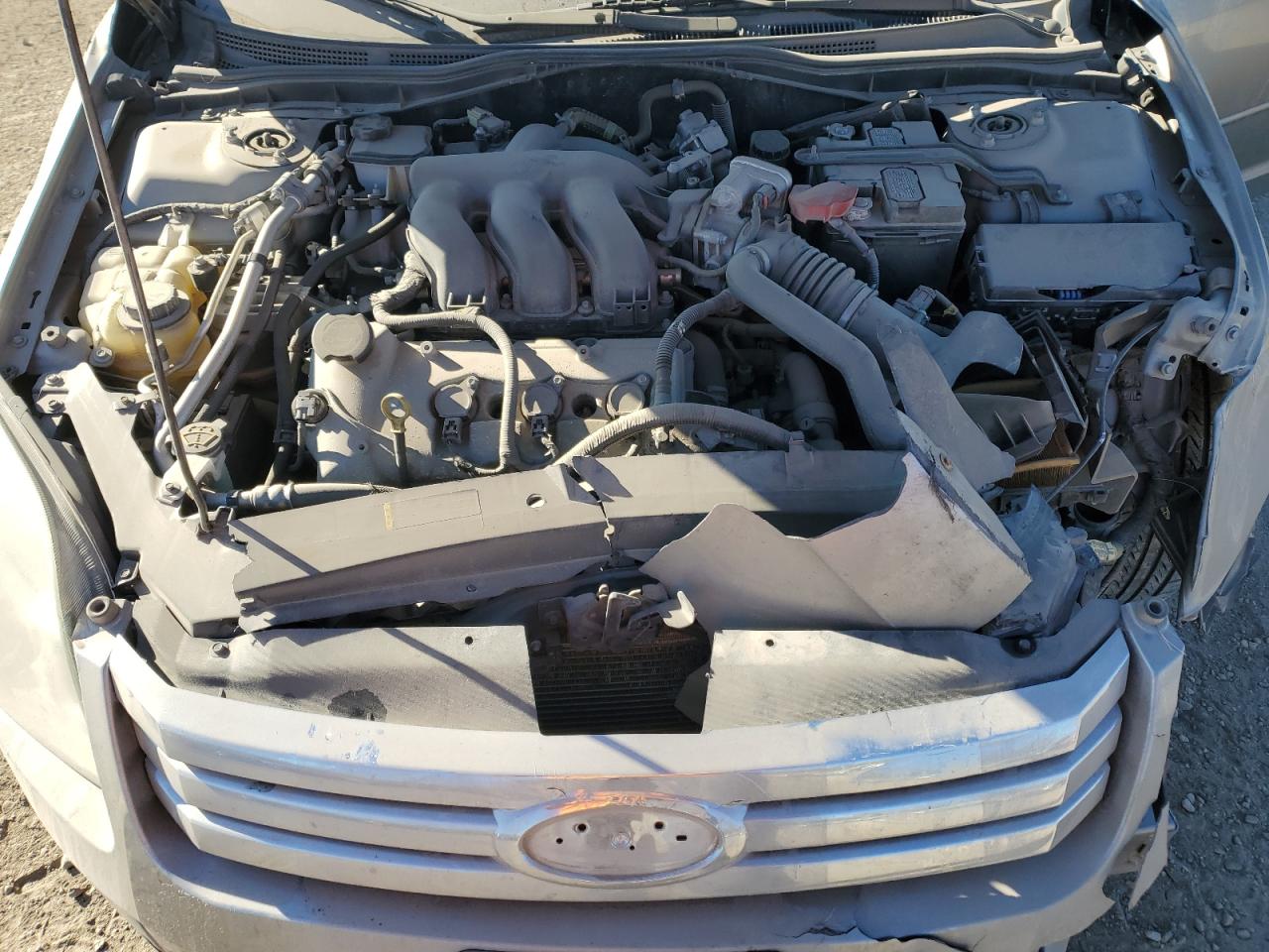 2009 Ford Fusion VIN 3FAHP07169R162909 Copart auction photo, front end / mechanical damage thumbnail 11