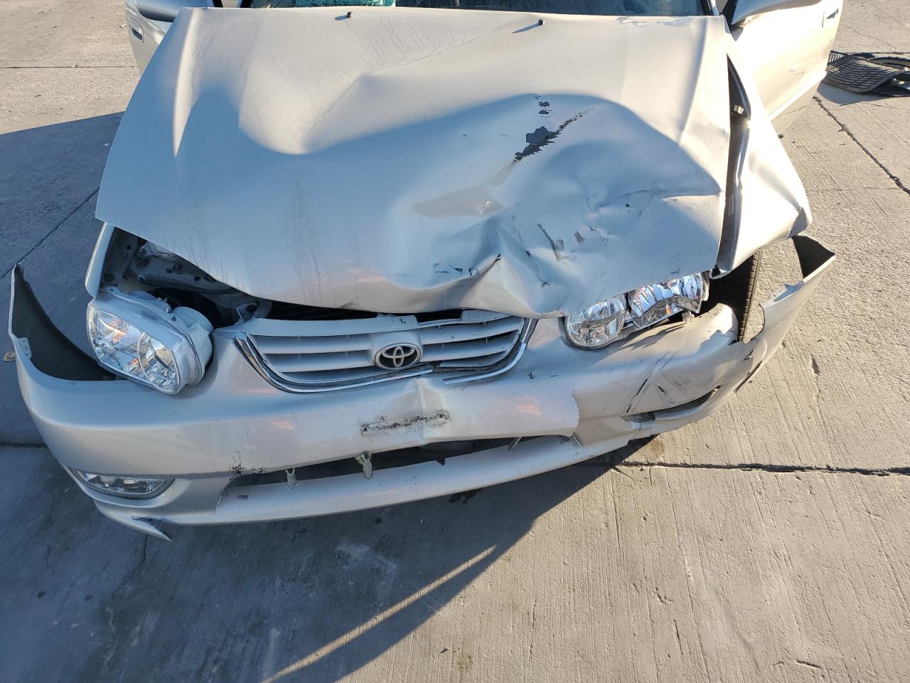 2001 Toyota Corolla VIN 1NXBR12E81Z469047 Copart auction photo, front end damage thumbnail 13