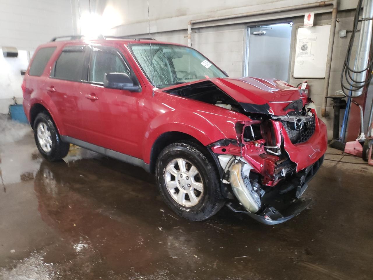2010 Mazda Tribute VIN 4F2CY9GG8AKM07504 Copart auction photo, front end / minor dent/scratches damage thumbnail 4