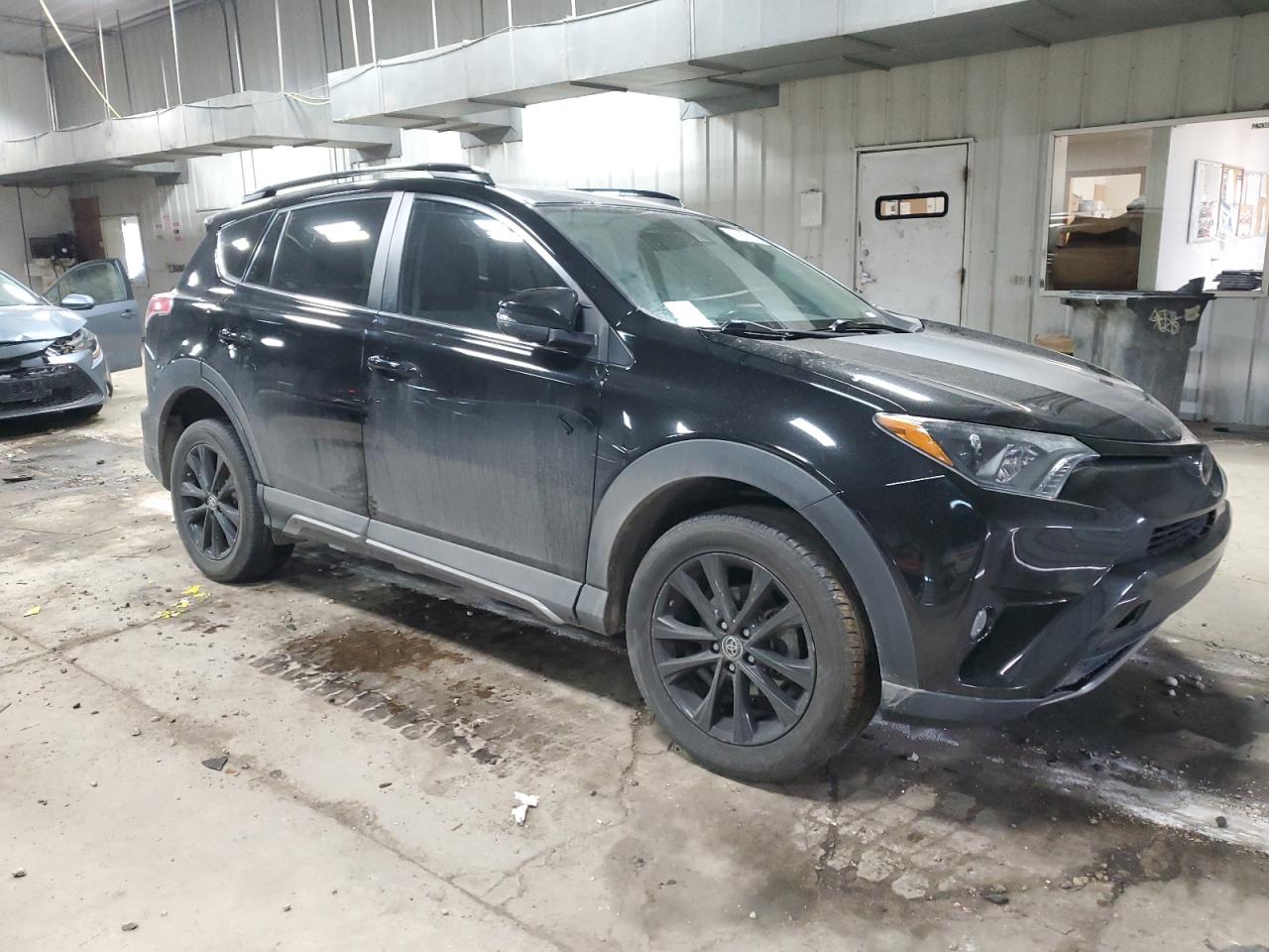 2018 Toyota RAV 4 VIN 2T3WFREV9JW460370 Copart auction photo, front end / rear end damage thumbnail 4