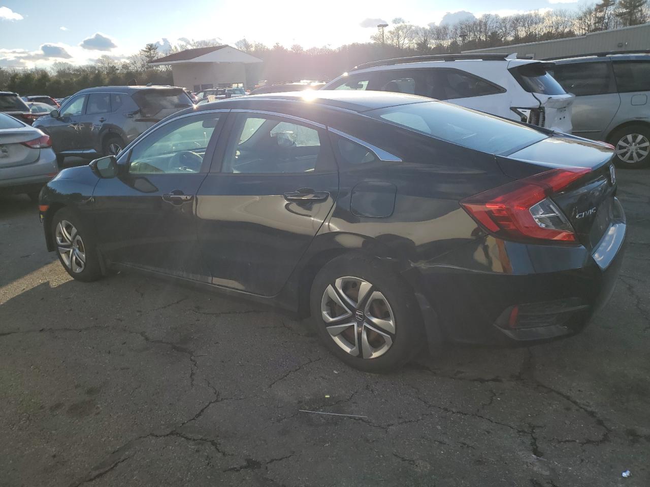 2017 Honda Civic VIN 19XFC2F50HE223304 Copart auction photo, side / front end damage thumbnail 2
