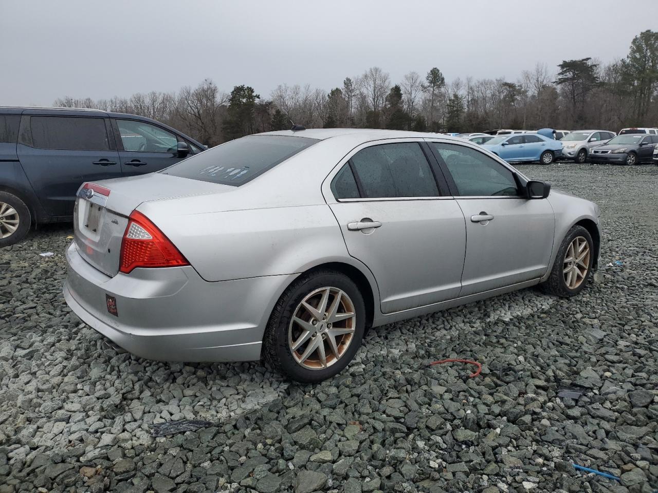 2011 Ford Fusion VIN 3FAHP0JA5BR140933 Copart auction photo, all over damage thumbnail 3
