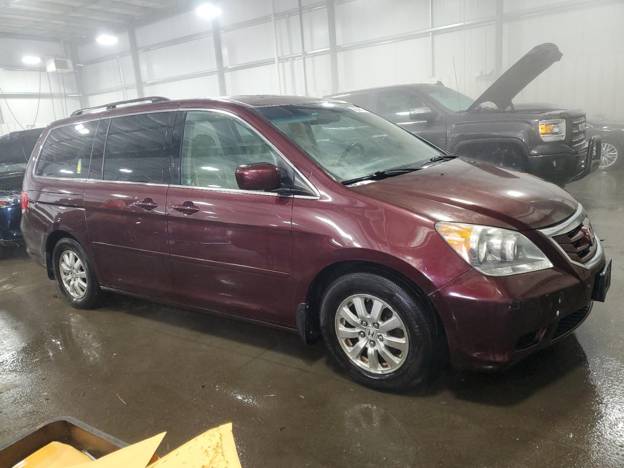 2010 Honda Odyssey VIN 5FNRL3H73AB037001 Copart auction photo, front end damage thumbnail 4