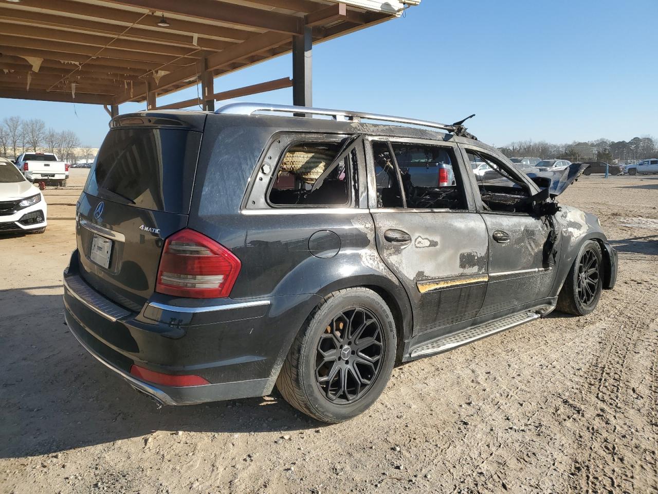 2010 Mercedes-Benz GL-klasse VIN 4JGBF7BE7AA576085 Copart auction photo, burn damage thumbnail 3