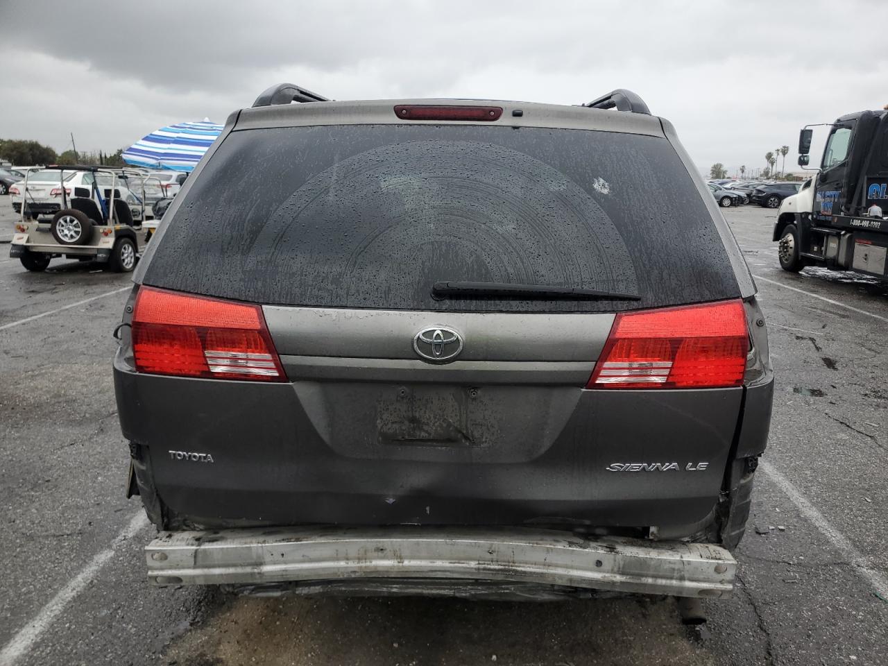 2004 Toyota Sienna VIN 5TDZA23C94S074123 Copart auction photo, rear end / minor dent/scratches damage thumbnail 6