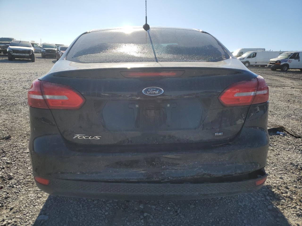 2018 Ford Focus VIN 1FADP3F2XJL257261 Copart auction photo, front end / all over damage thumbnail 6