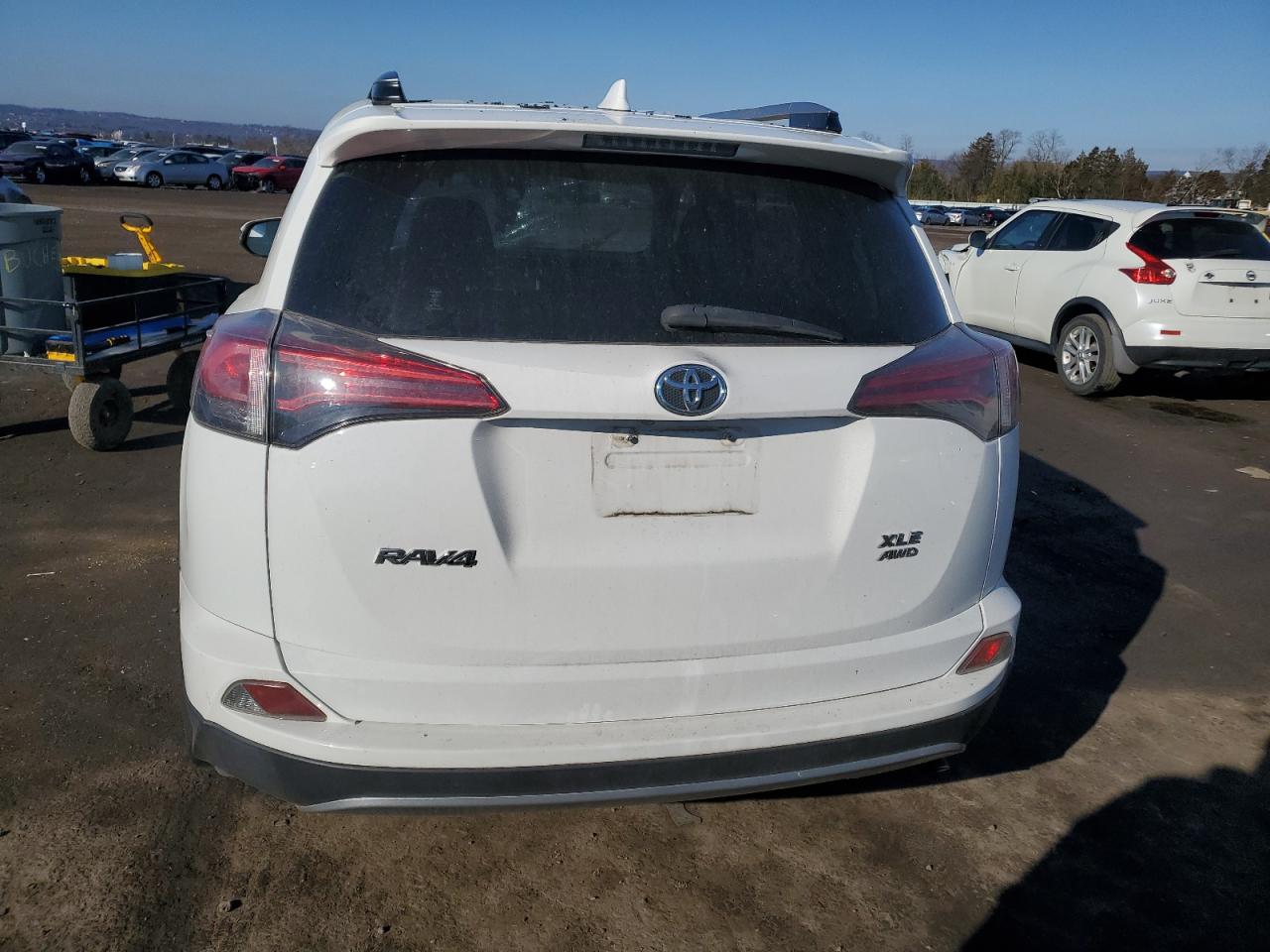 2017 Toyota RAV 4 VIN JTMRFREV8HD209487 Copart auction photo, front end / top/roof damage thumbnail 6