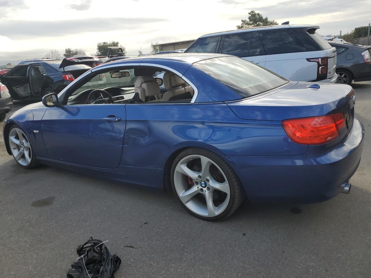 2011 BMW 3er VIN WBADX7C57BE261271 Copart auction photo, side / front end damage thumbnail 2