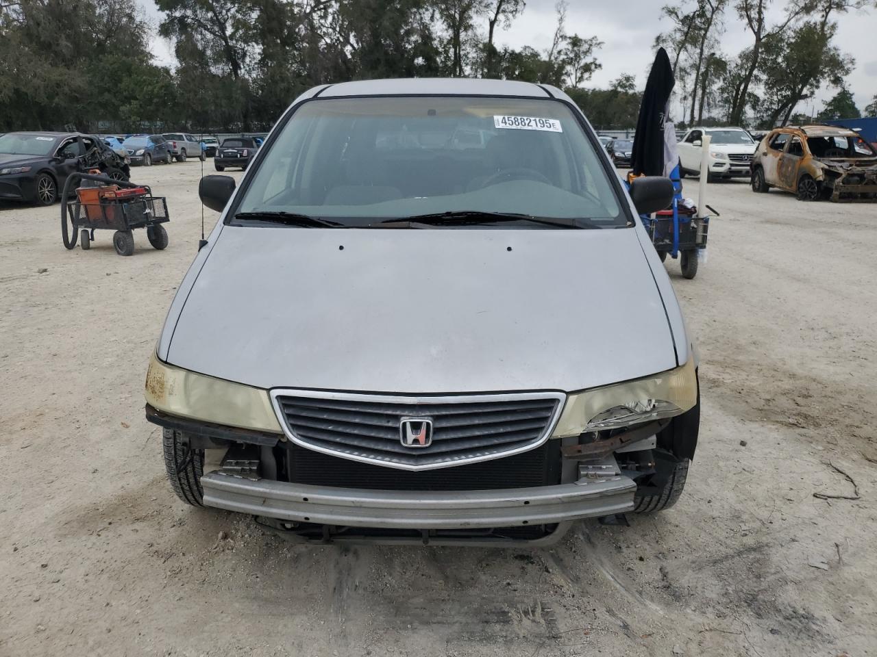 2001 Honda Odyssey VIN 2HKRL18541H573508 Copart auction photo, front end / all over damage thumbnail 5
