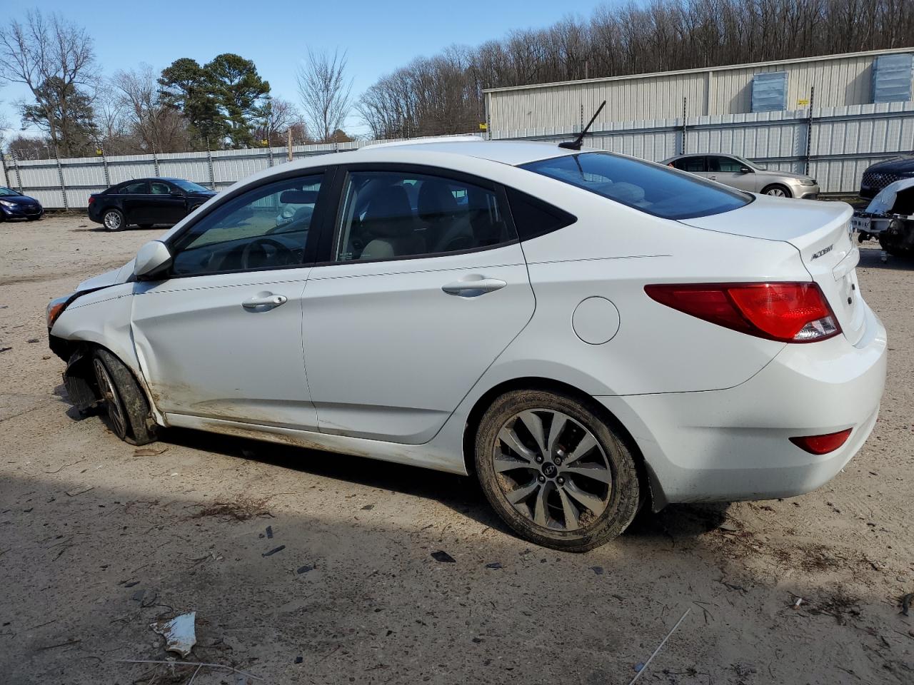 2015 Hyundai Accent VIN KMHCU4AEXFU806119 Copart auction photo, front end / side damage thumbnail 2