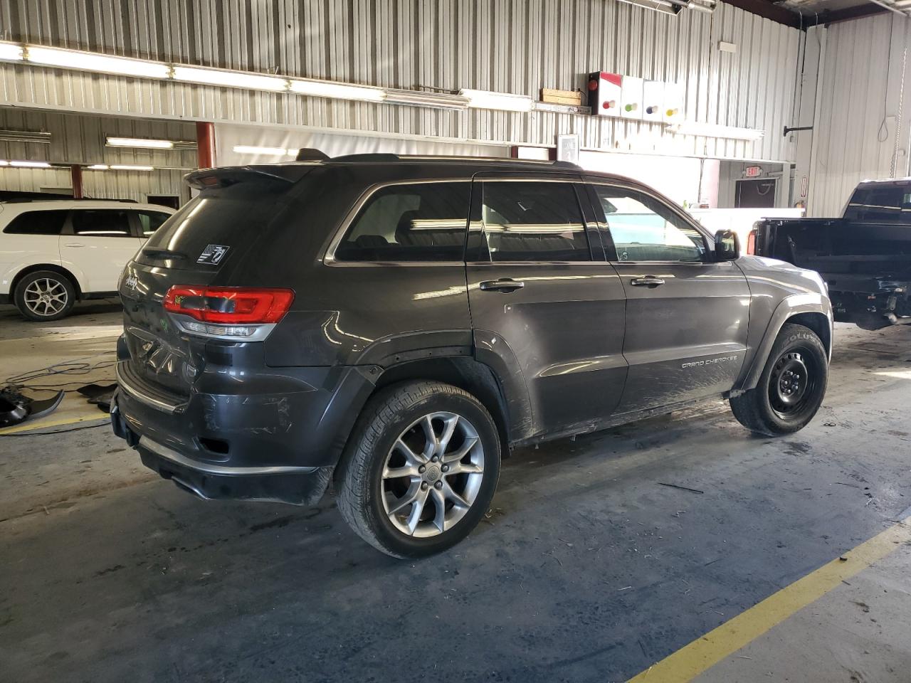 2015 Jeep Grand Cherokee VIN 1C4RJFJM9FC711776 Copart auction photo, rear end / side damage thumbnail 3