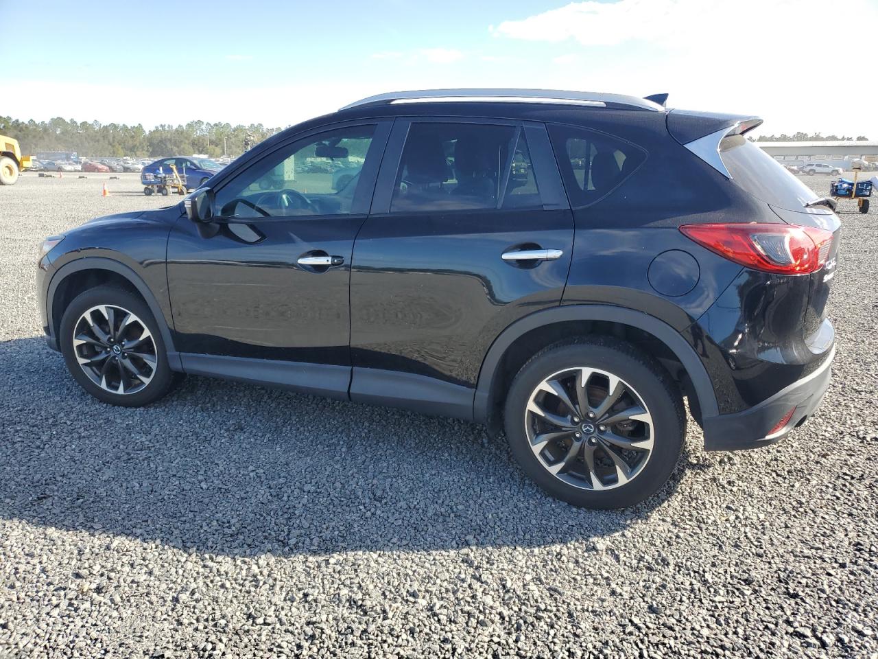 2016 Mazda CX-5 VIN JM3KE2DY5G0696281 Copart auction photo, water/flood damage thumbnail 2