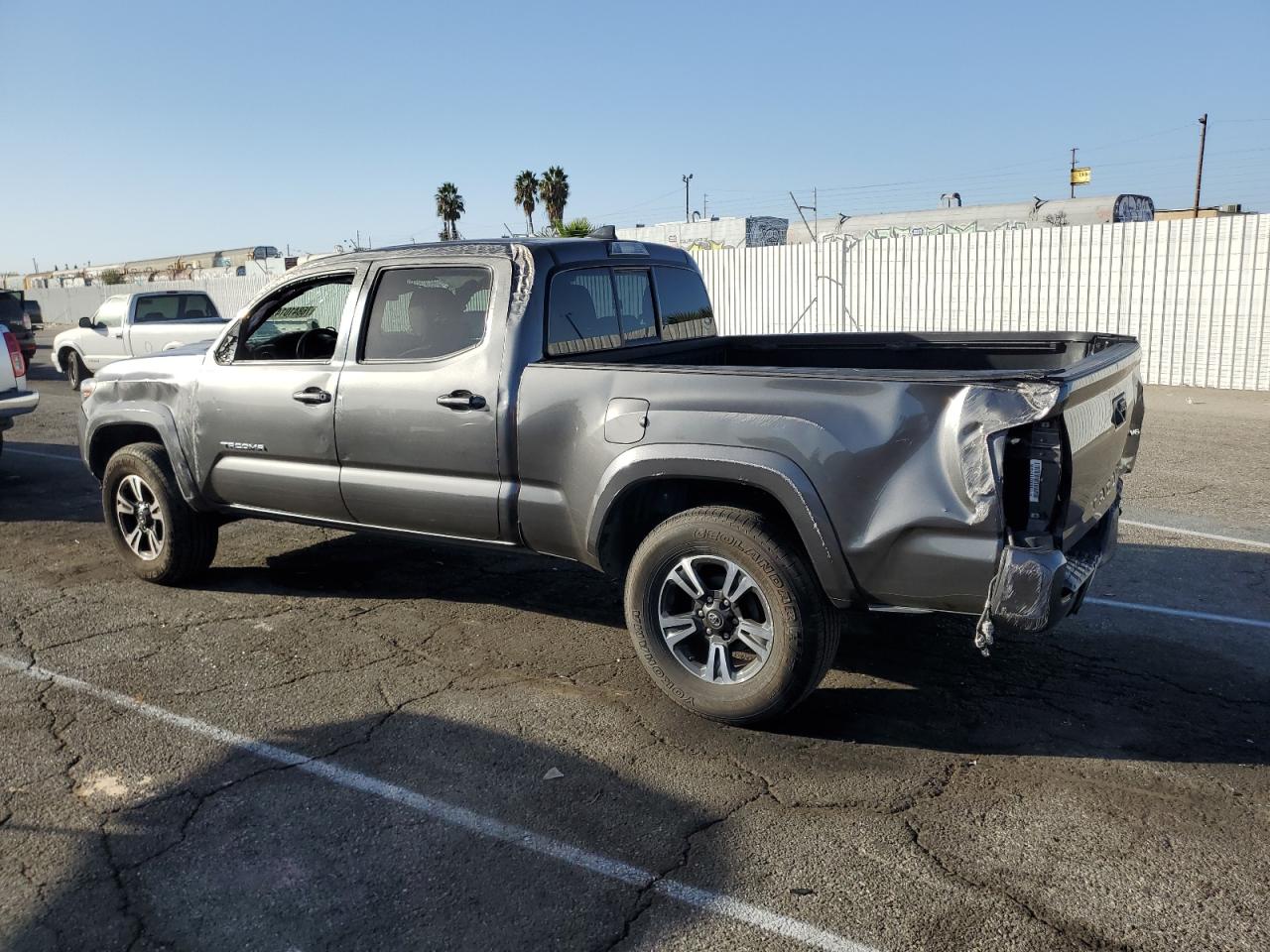 2016 Toyota Tacoma VIN 3TMBZ5DN1GM005717 Copart auction photo, rollover damage thumbnail 2