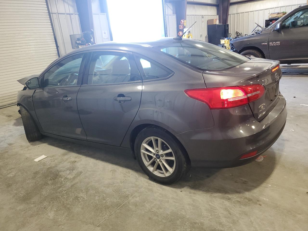 2015 Ford Focus VIN 1FADP3F2XFL214174 Copart auction photo, front end damage thumbnail 2