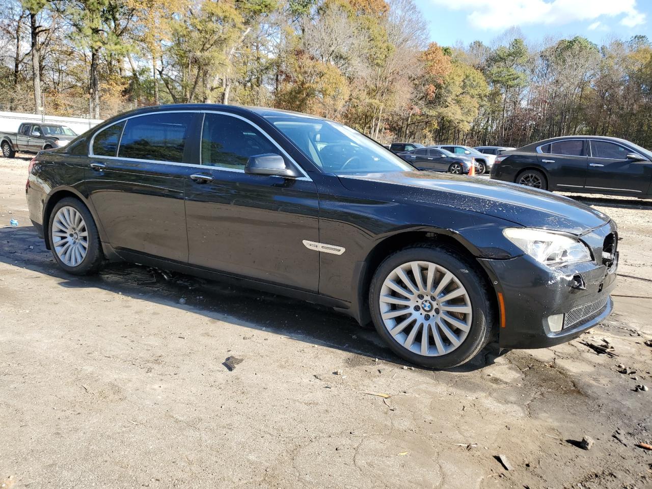 2012 BMW 7er VIN WBAKC8C51CC435390 Copart auction photo, front end damage thumbnail 4