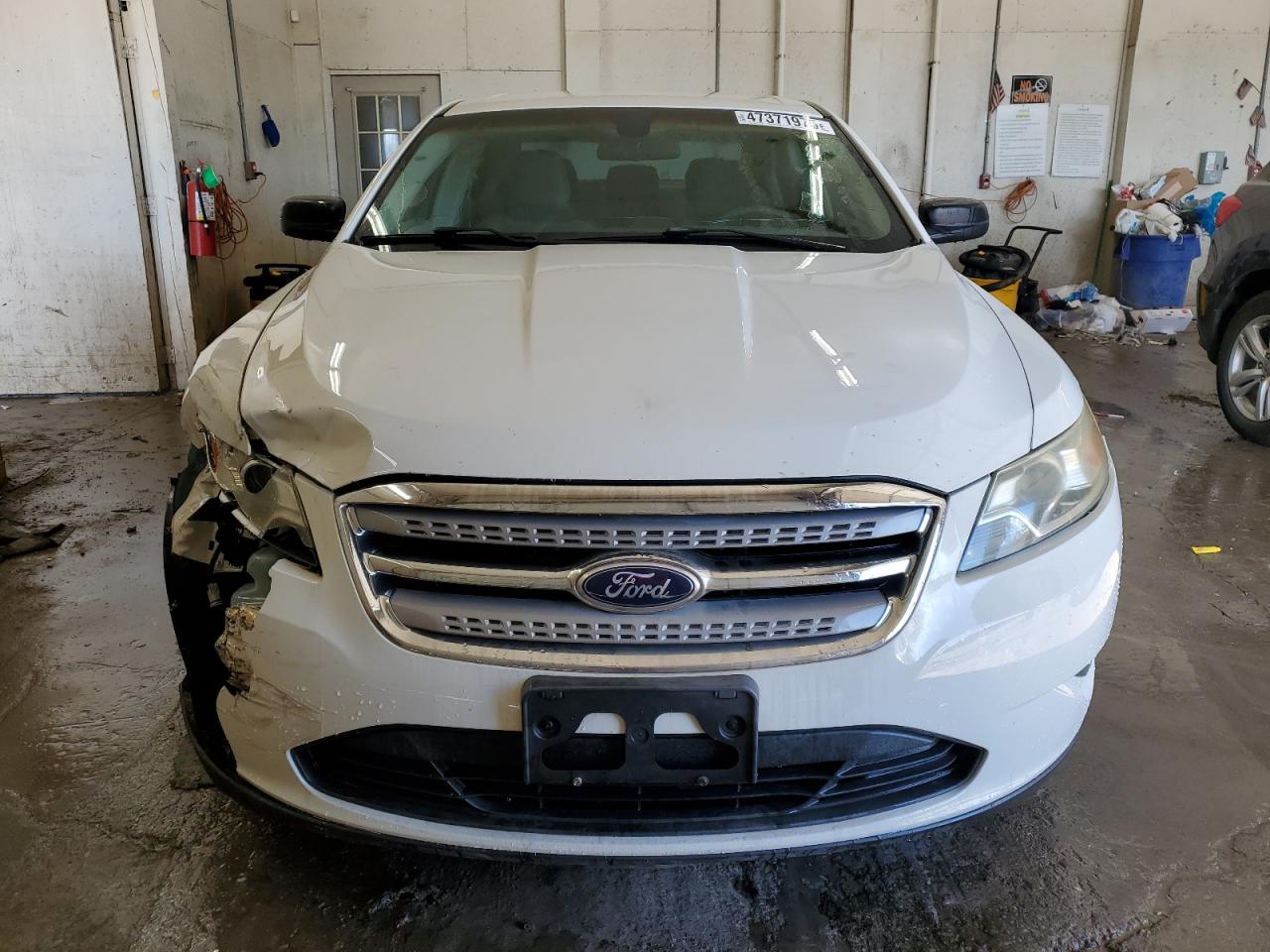 2012 Ford Taurus VIN 1FAHP2DW0CG125736 Copart auction photo, front end / minor dent/scratches damage thumbnail 5