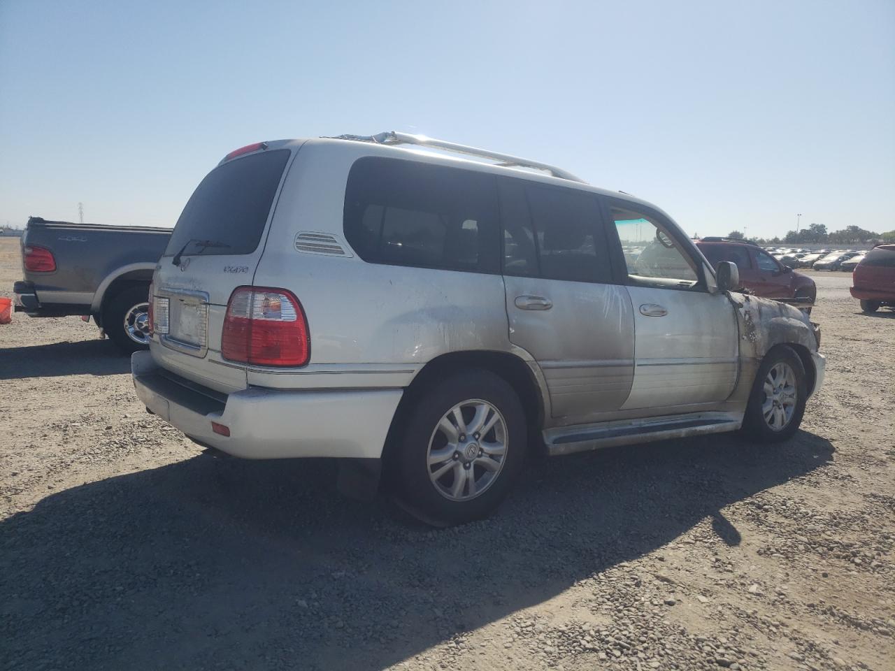 2004 Lexus LX VIN JTJHT00W743548576 Copart auction photo, burn damage thumbnail 3