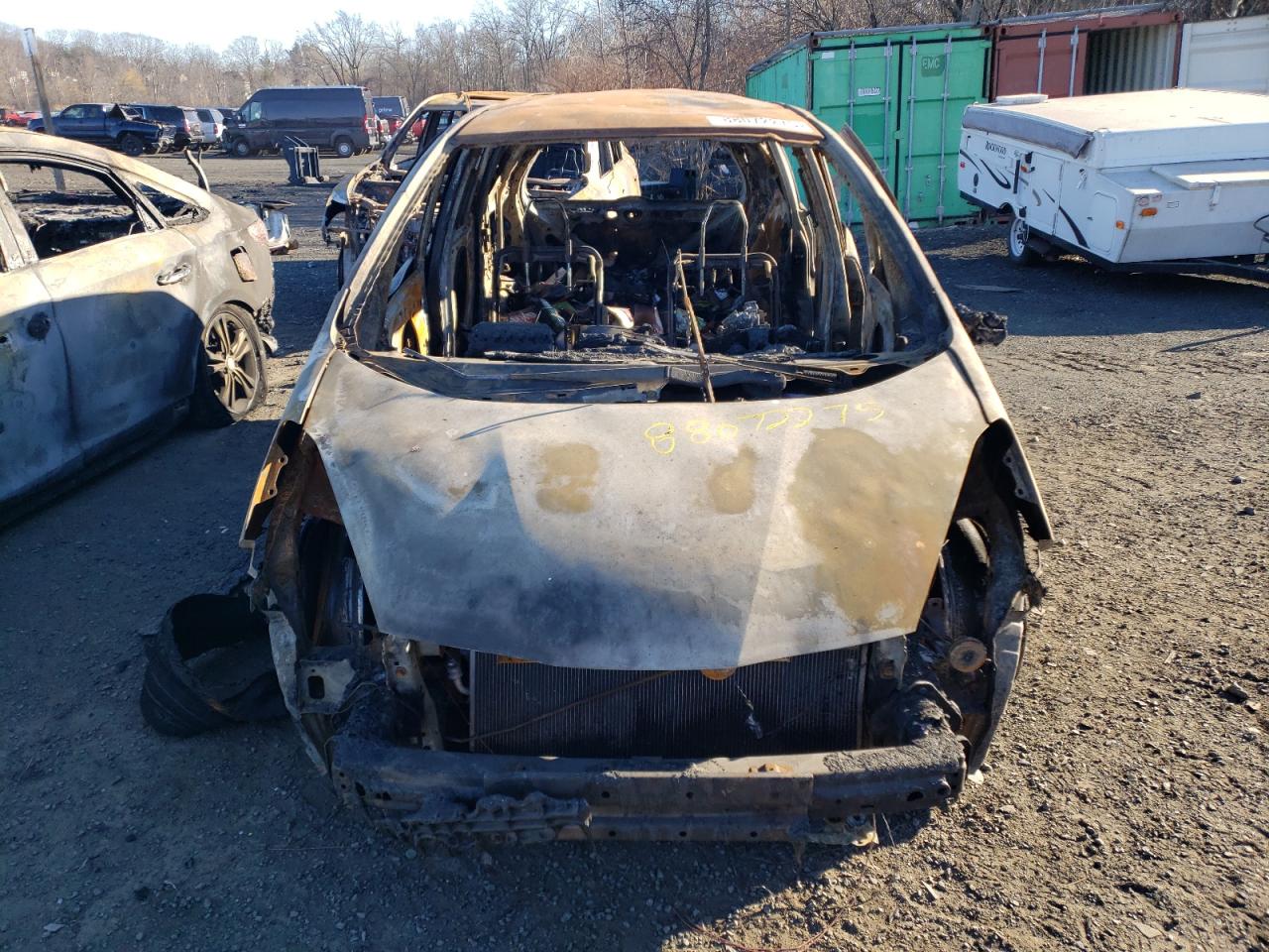 2010 Honda Fit VIN JHMGE8H45AS018049 Copart auction photo, burn damage thumbnail 5