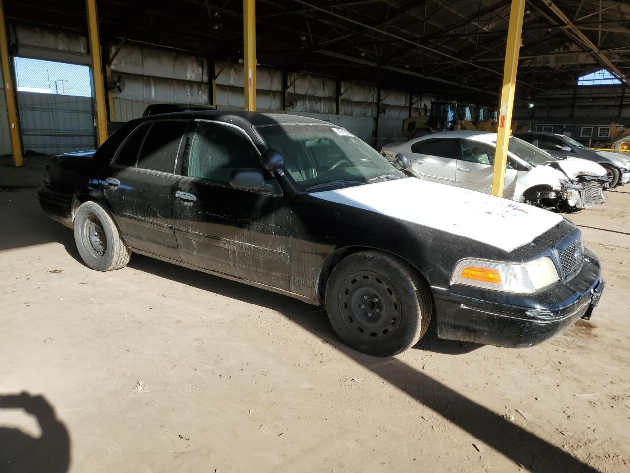 2005 Ford Crown Victoria VIN 2FAFP71WX5X105158 Copart auction photo, side / rear end damage thumbnail 4