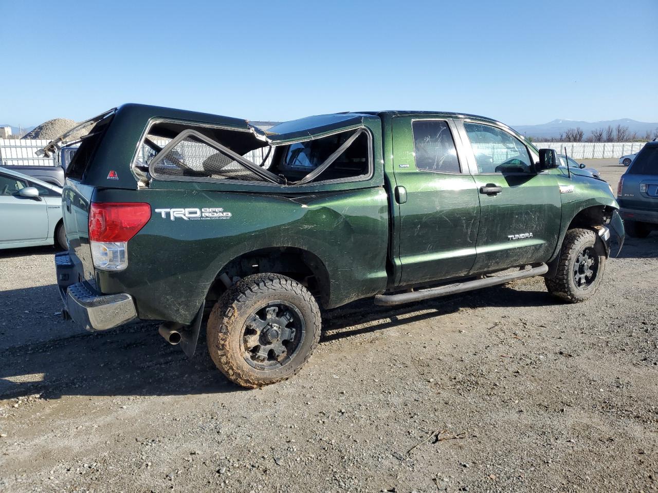 2010 Toyota Tundra VIN 5TFUY5F14AX117533 Copart auction photo, rollover damage thumbnail 3