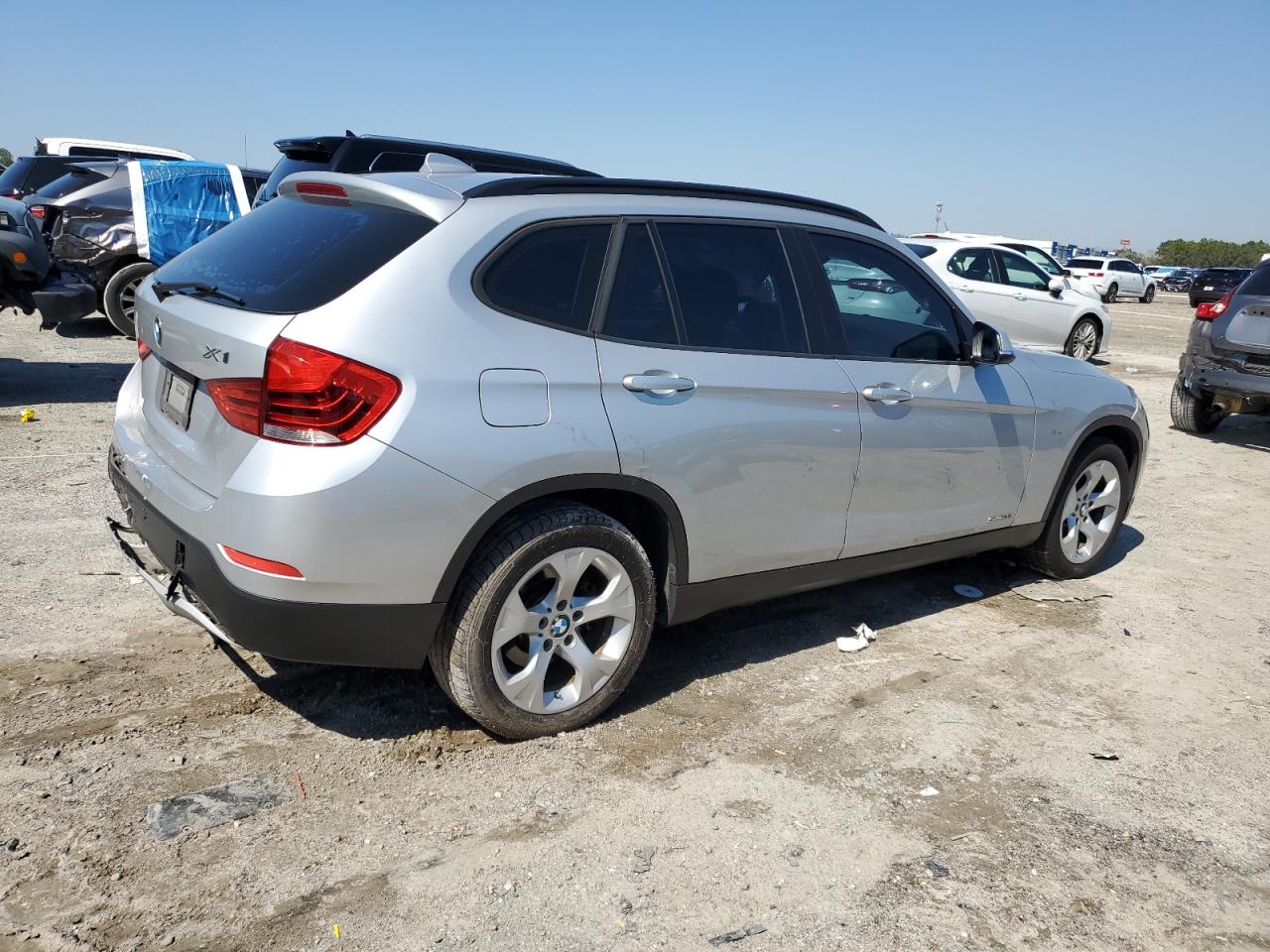 2015 BMW X1 VIN WBAVM1C51FVZ94111 Copart auction photo, rear end damage thumbnail 3