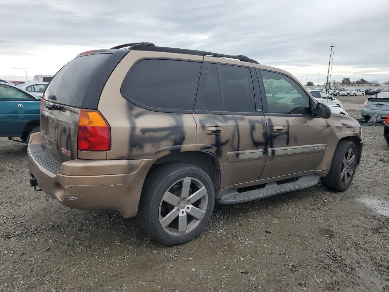 2003 GMC Envoy VIN 1GKDT13S432263407 Copart auction photo, vandalism damage thumbnail 3