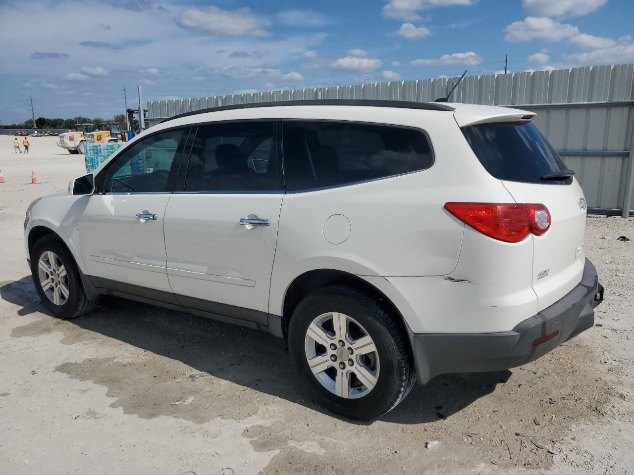 2012 Chevrolet Traverse VIN 1GNKRGED1CJ285381 Copart auction photo, side / rear end damage thumbnail 2