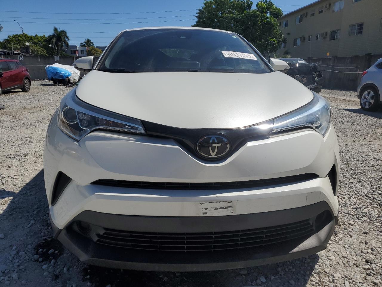 2019 Toyota C-HR VIN NMTKHMBX7KR096940 Copart auction photo, side damage thumbnail 5