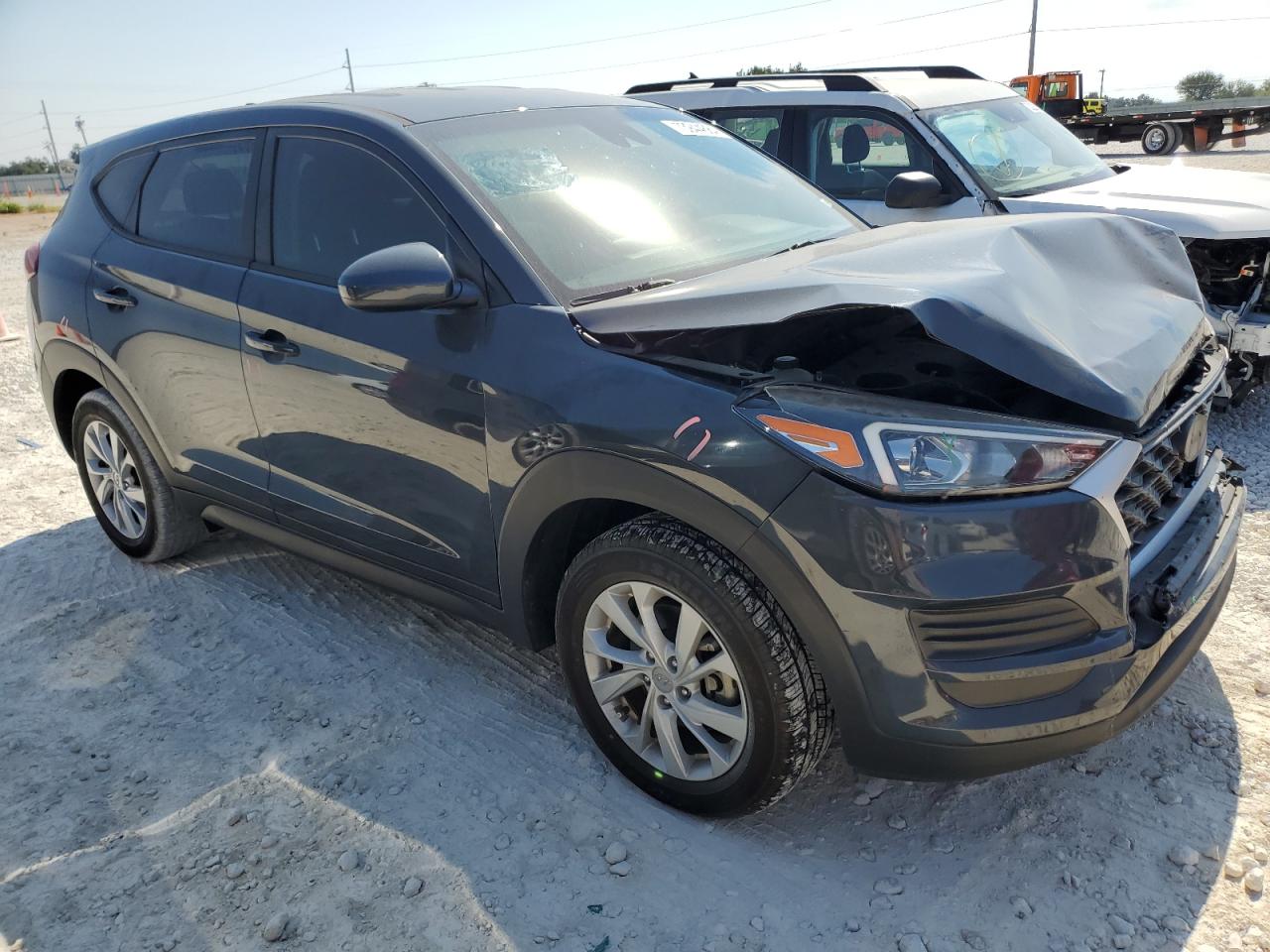 2019 Hyundai Tucson VIN KM8J23A41KU074617 Copart auction photo, front end / rear end damage thumbnail 4