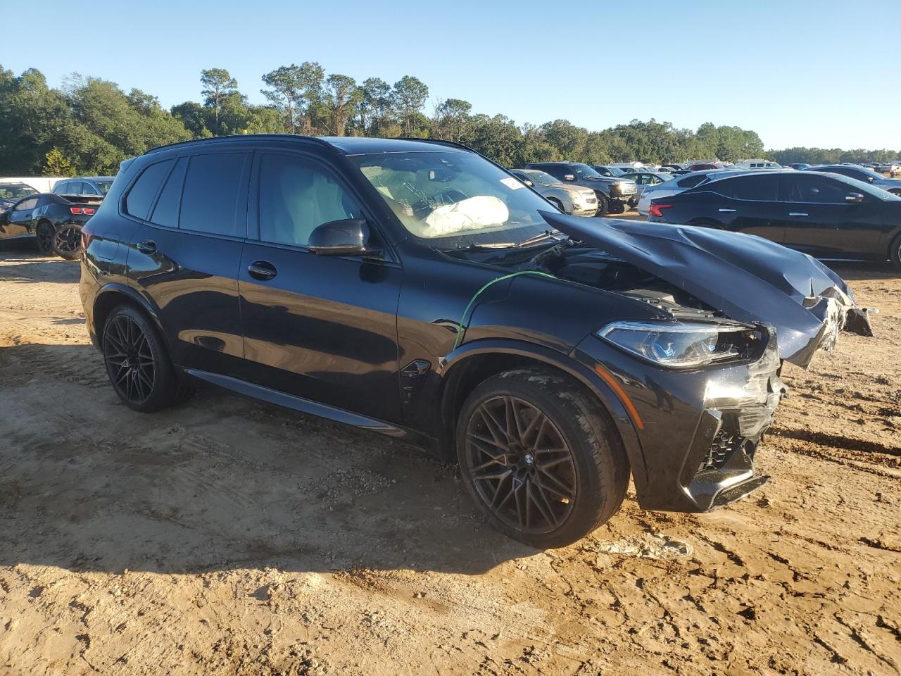 2021 BMW X5 VIN 5YMJU0C03M9D99549 Copart auction photo, front end damage thumbnail 4