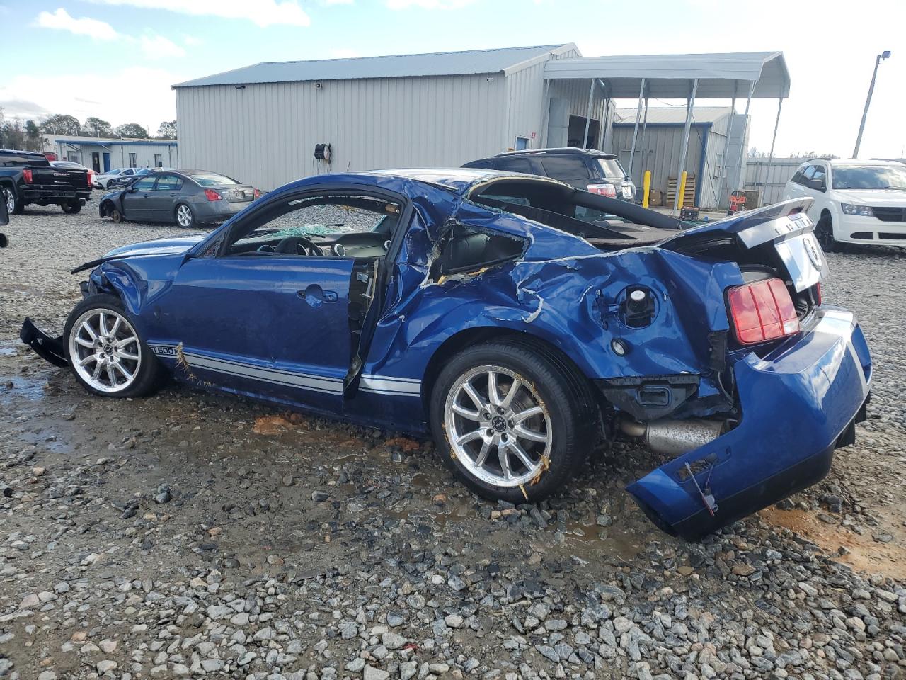2009 Ford Mustang VIN 1ZVHT88S695140873 Copart auction photo, all over damage thumbnail 2