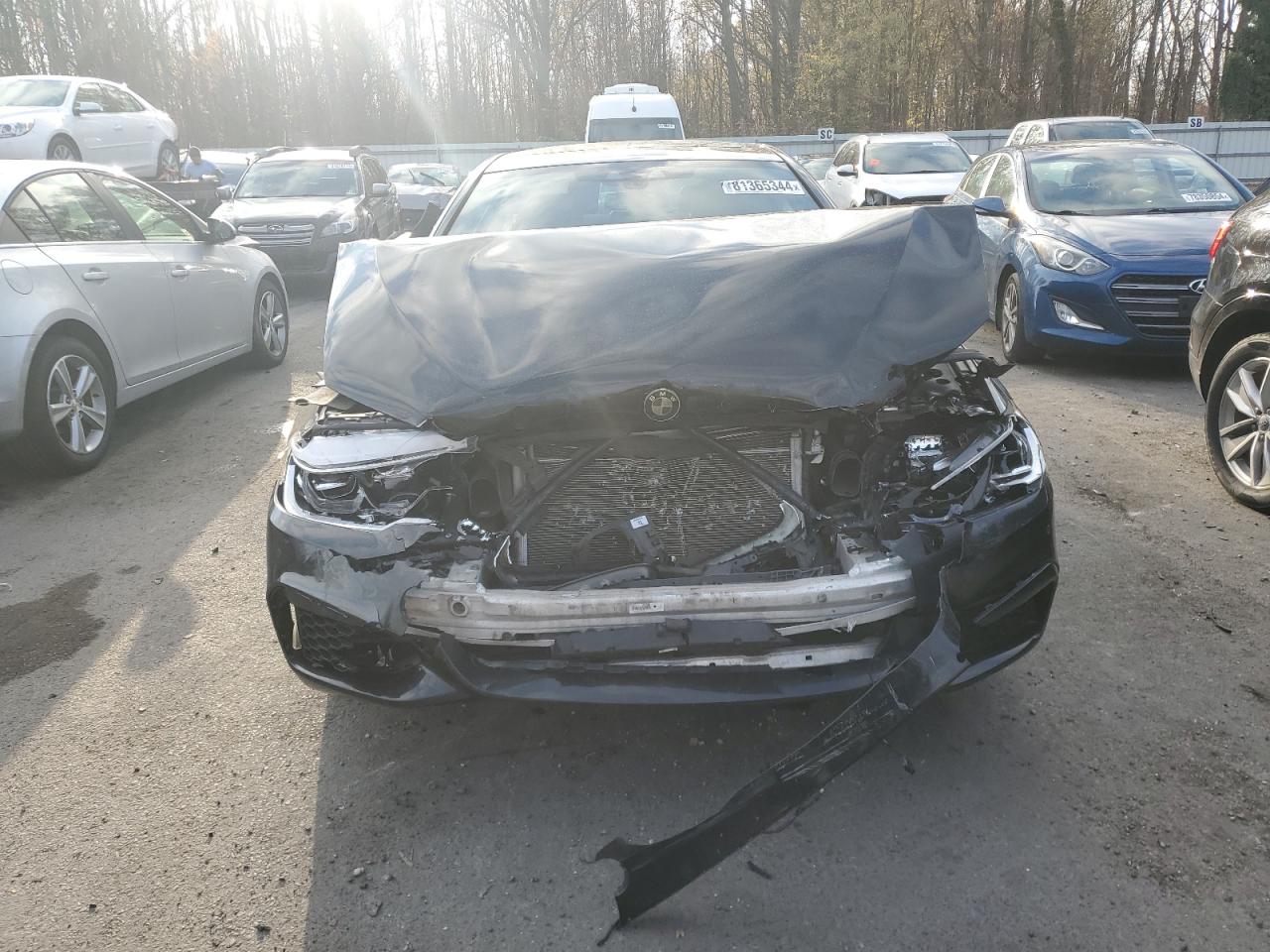 2018 BMW M5 VIN WBAJB9C57JB049127 Copart auction photo, front end damage thumbnail 5