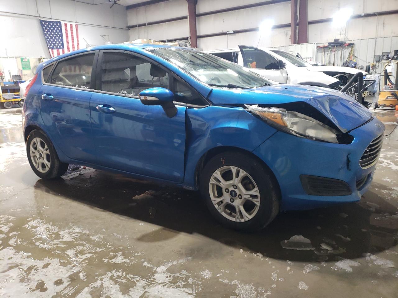 2016 Ford Fiesta VIN 3FADP4EJ2GM108056 Copart auction photo, front end / hail damage thumbnail 4