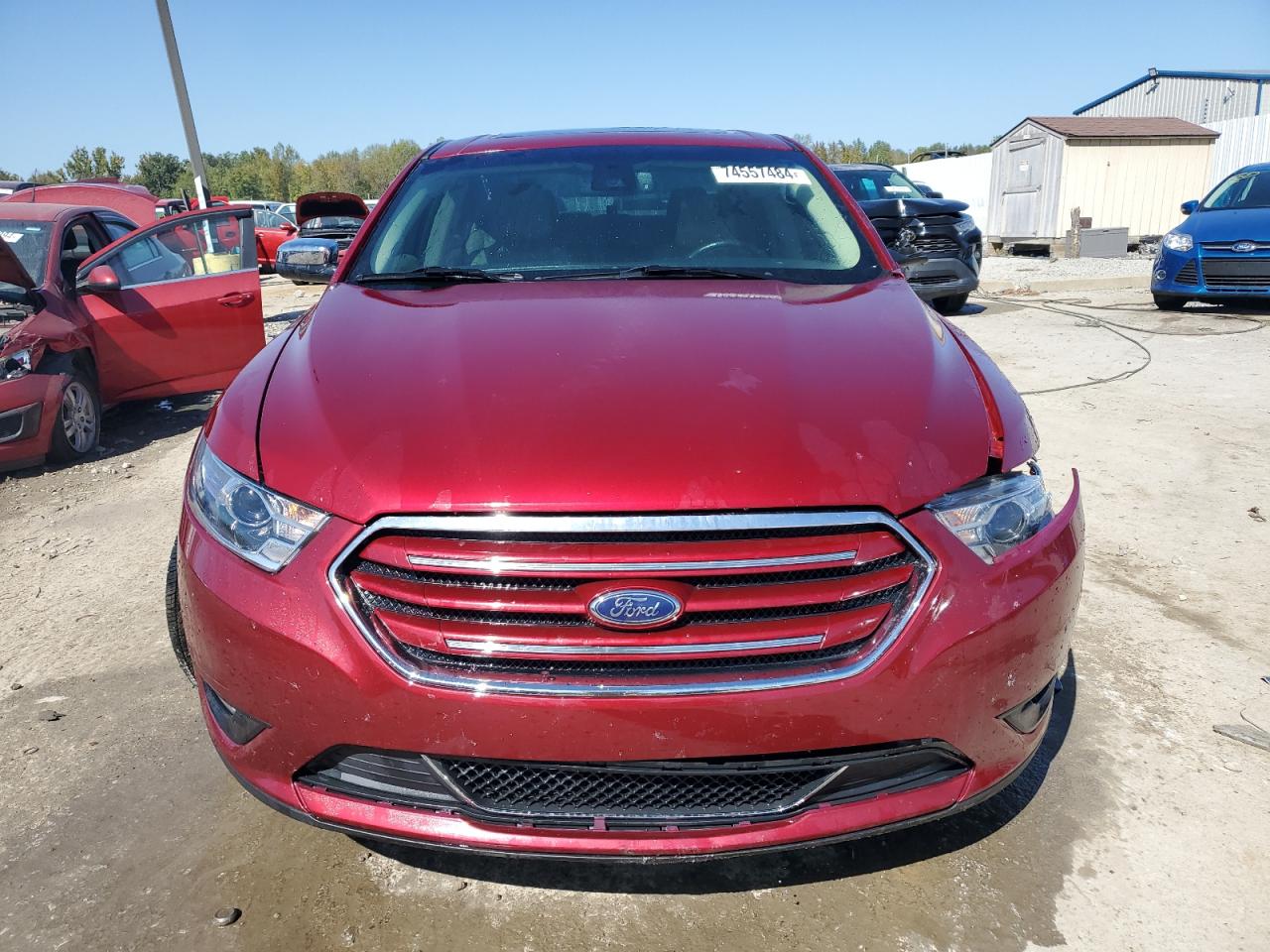 2019 Ford Taurus VIN 1FAHP2F87KG114570 Copart auction photo, side / front end damage thumbnail 5