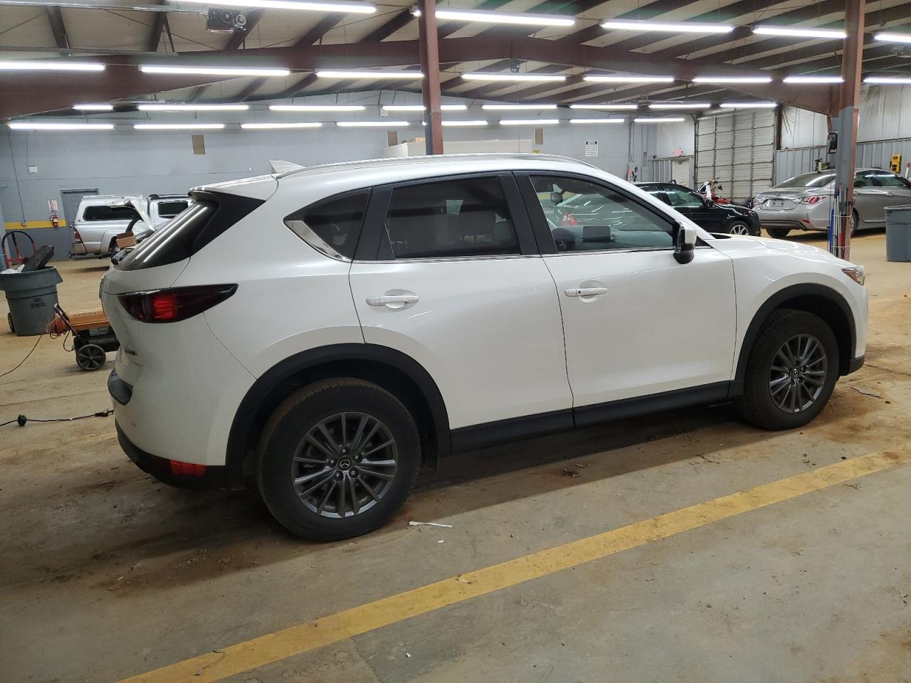 2021 Mazda CX-5 VIN JM3KFACM9M0371831 Copart auction photo, side / minor dent/scratches damage thumbnail 3