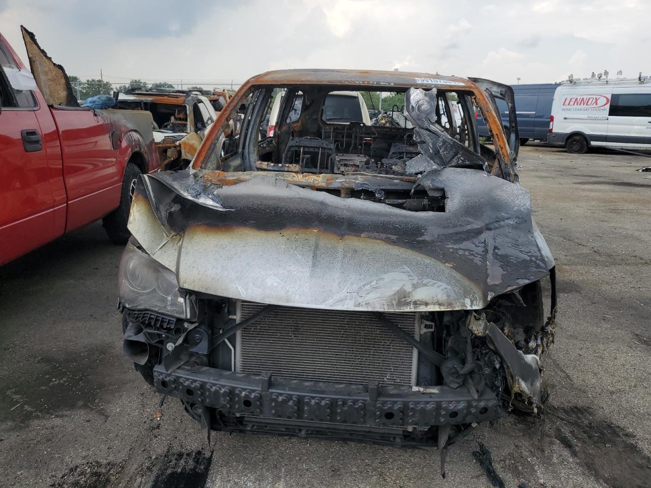 2019 Dodge Caravan VIN 2C4RDGCG7KR621256 Copart auction photo, burn damage thumbnail 5
