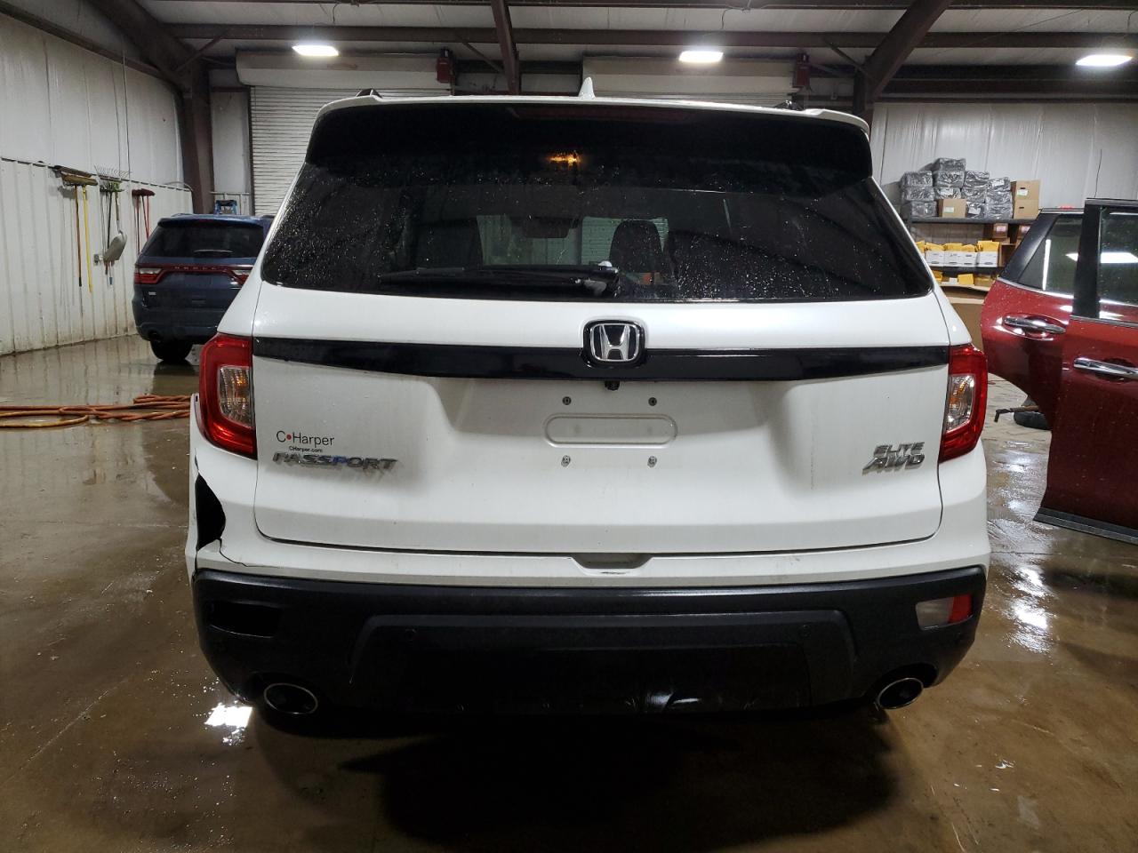 2021 Honda Passport VIN 5FNYF8H04MB007206 Copart auction photo, side / front end damage thumbnail 6