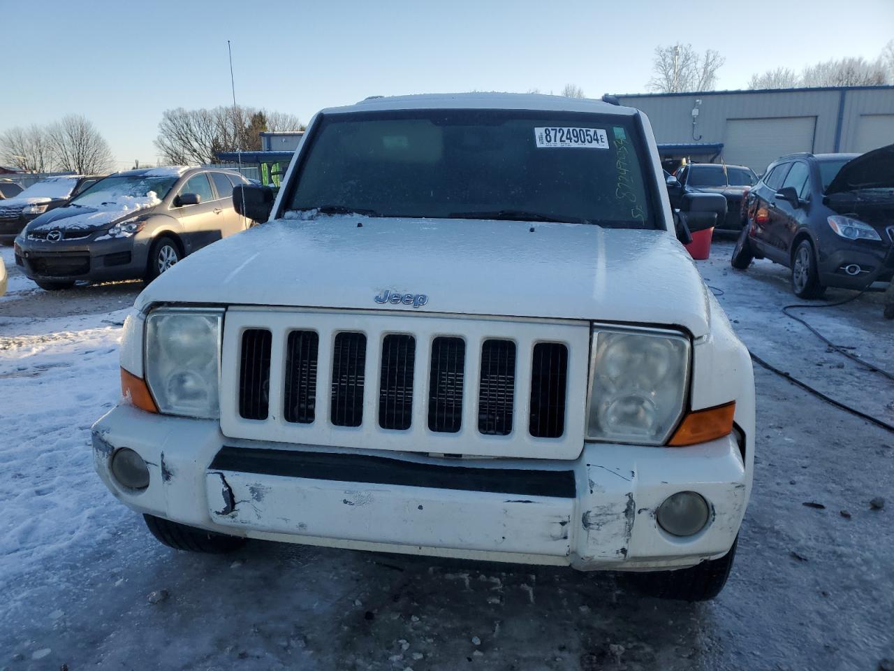 2006 Jeep Commander VIN 1J8HG48N36C257790 Copart auction photo, side / front end damage thumbnail 5
