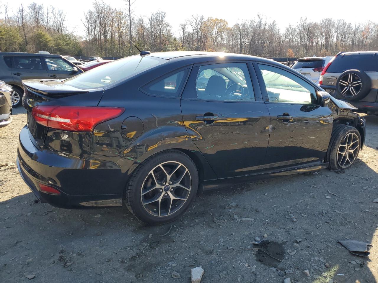 2015 Ford Focus VIN 1FADP3F29FL297662 Copart auction photo, side / minor dent/scratches damage thumbnail 3