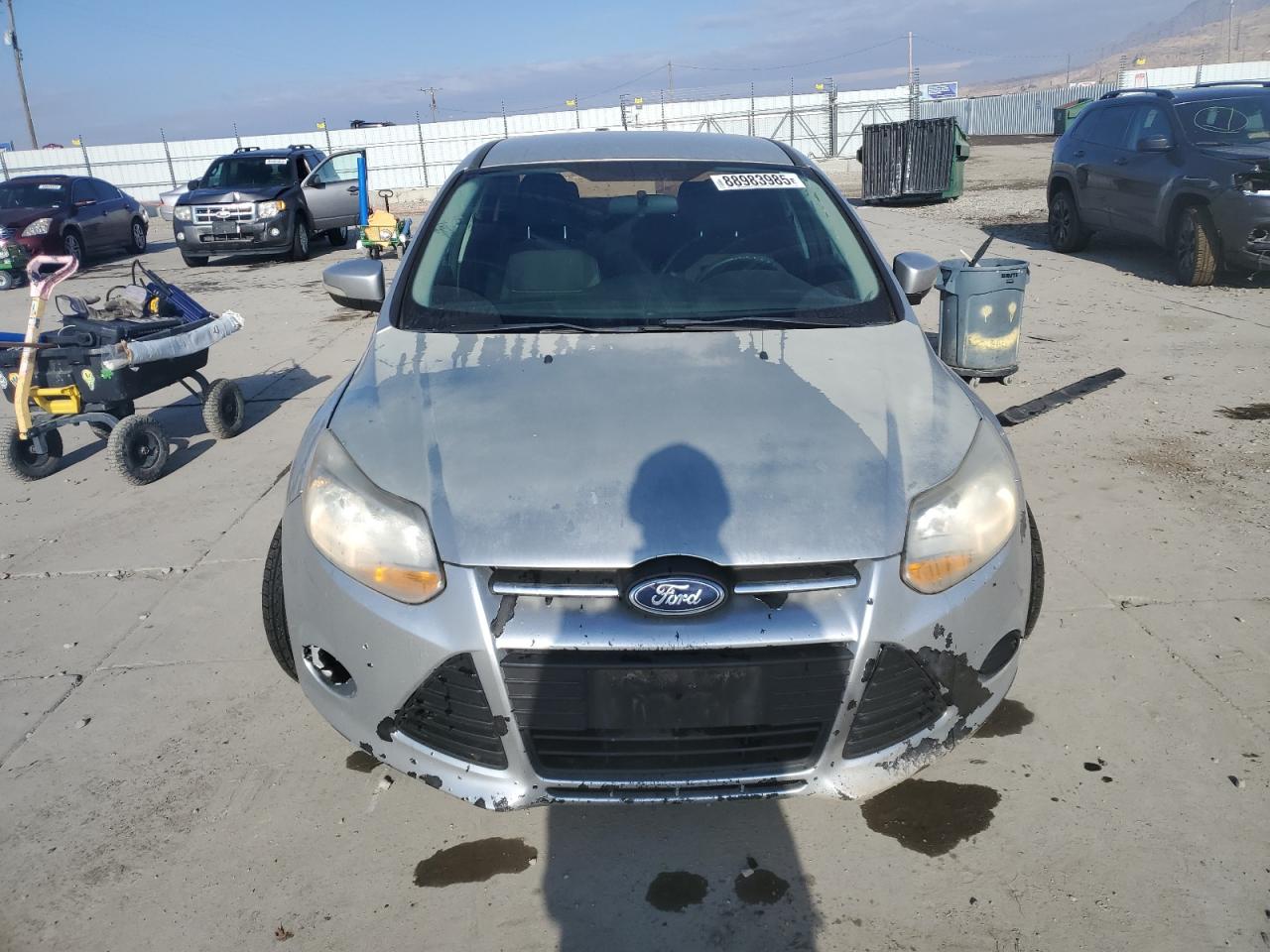2014 Ford Focus VIN 1FADP3F2XEL462665 Copart auction photo, undercarriage / minor dent/scratches damage thumbnail 5