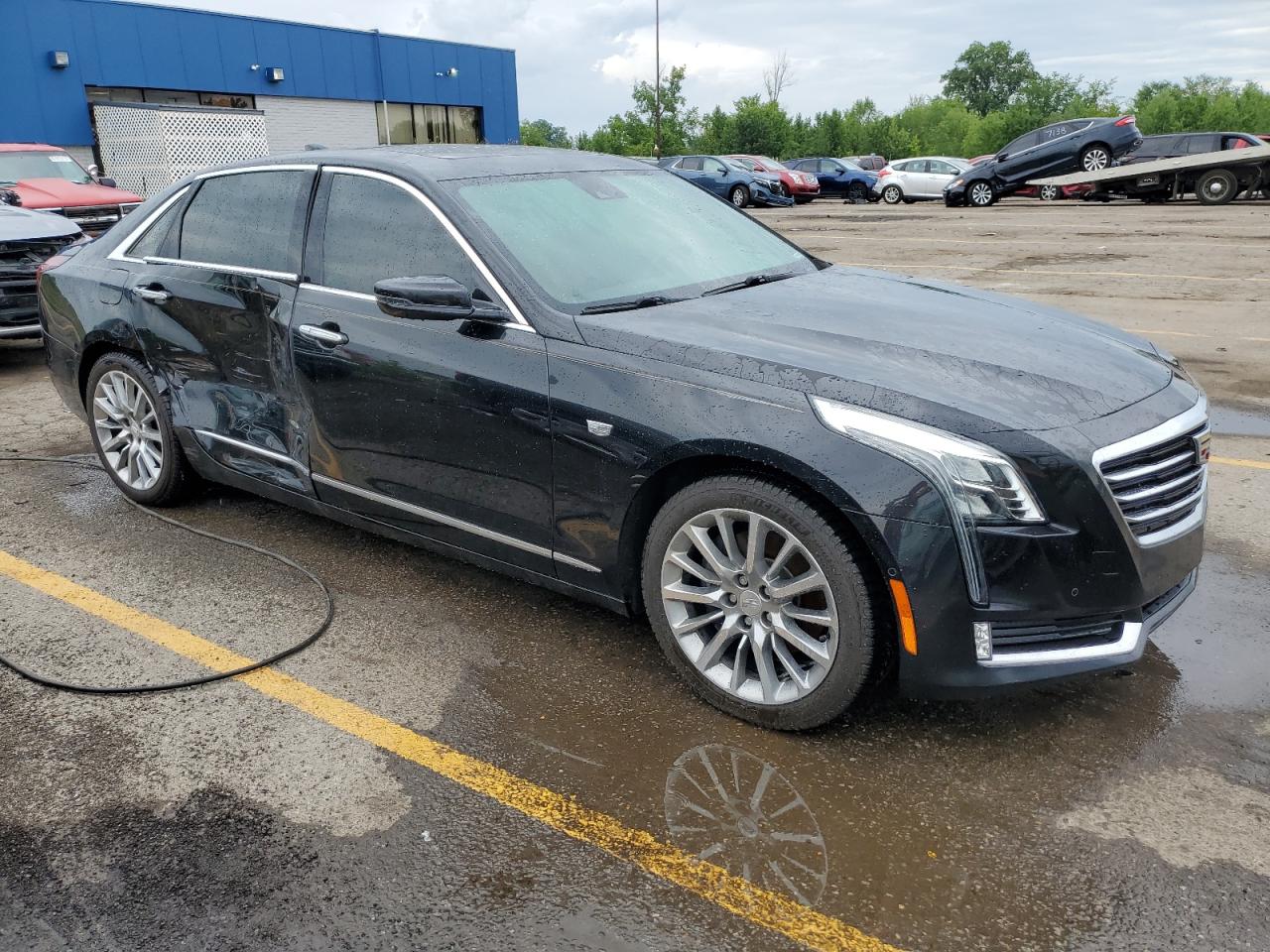 2018 Cadillac CT6 VIN 1G6KD5RS6JU159486 Copart auction photo, side damage thumbnail 4