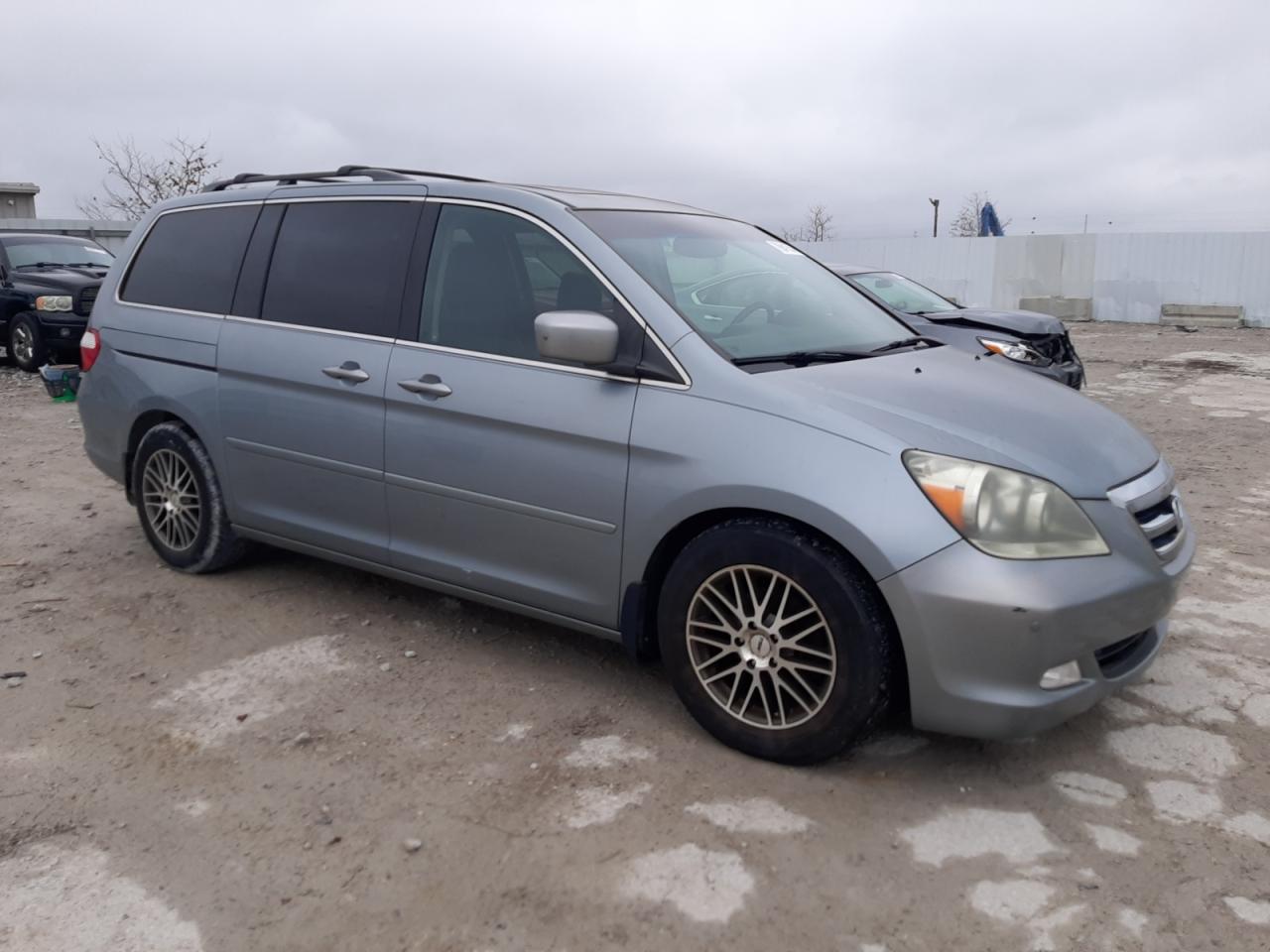 2007 Honda Odyssey VIN 5FNRL38857B013543 Copart auction photo, minor dent/scratches damage thumbnail 4