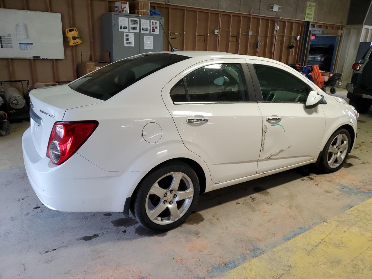 2012 Chevrolet Sonic VIN 1G1JE5SH9C4143735 Copart auction photo, front end / side damage thumbnail 3