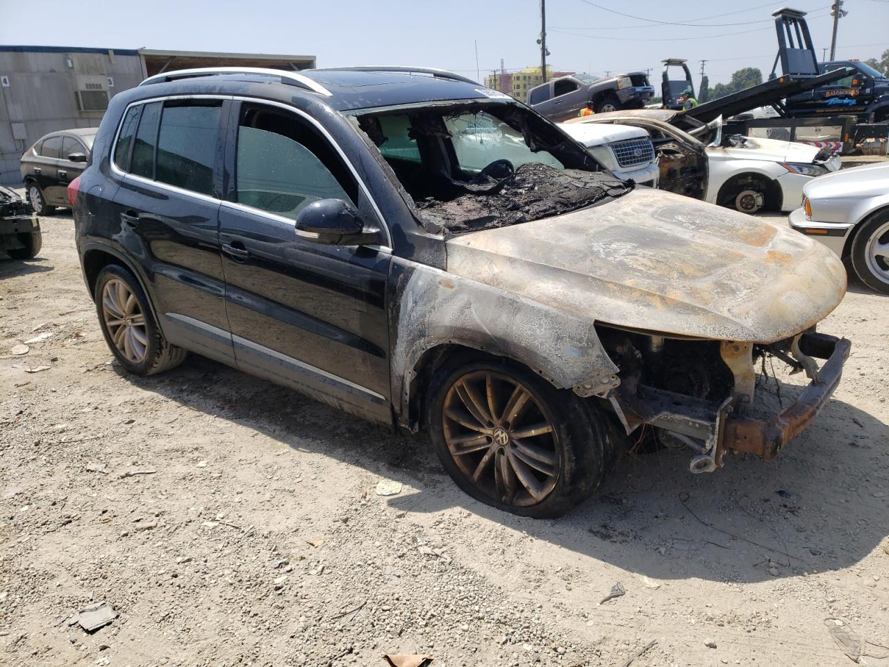 2015 Volkswagen Tiguan VIN WVGAV7AX6FW524300 Copart auction photo, burn - engine damage thumbnail 4