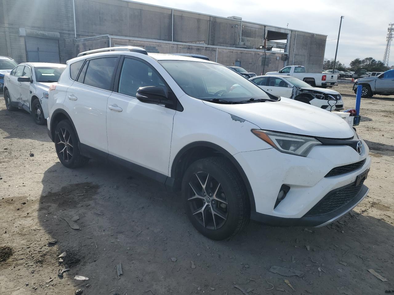 2016 Toyota RAV 4 VIN 2T3NFREV4GW303141 Copart auction photo, rear end / minor dent/scratches damage thumbnail 4