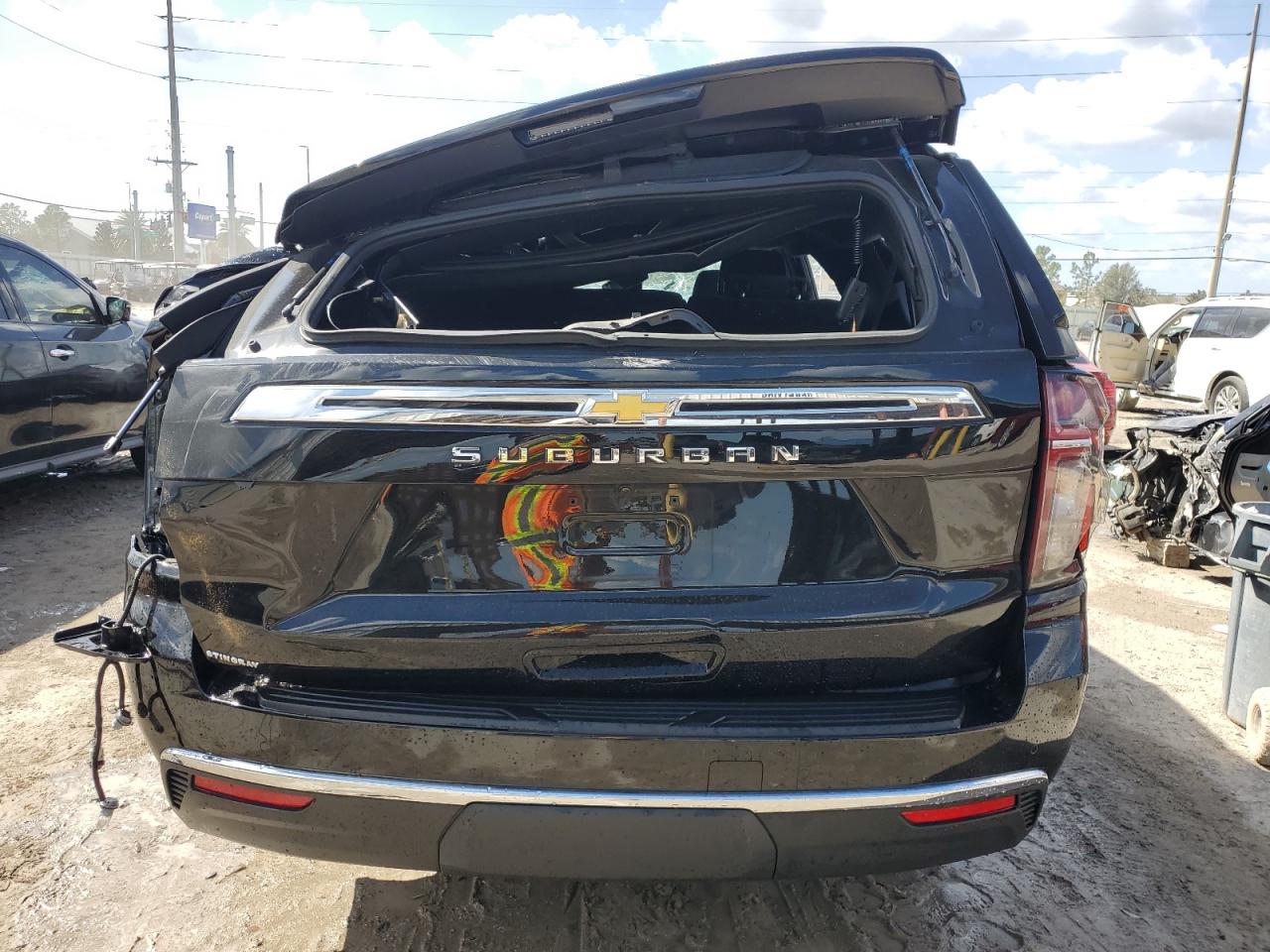 2023 Chevrolet Suburban VIN 1GNSCBKD3PR514241 Copart auction photo, top/roof / rear end damage thumbnail 6