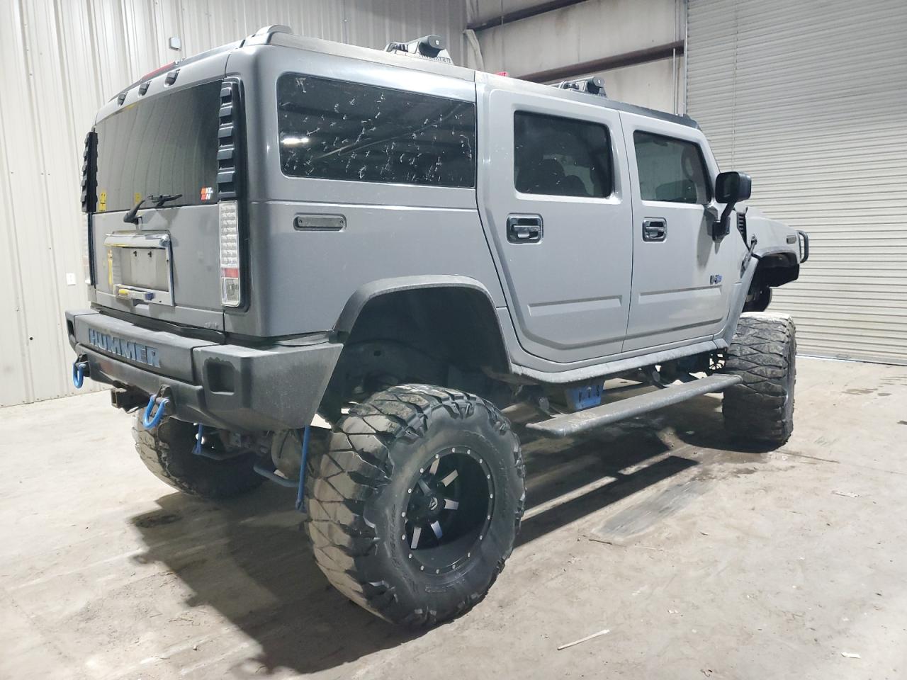 2003 Hummer H2 VIN 5GRGN23UX3H121083 Copart auction photo, minor dent/scratches damage thumbnail 3