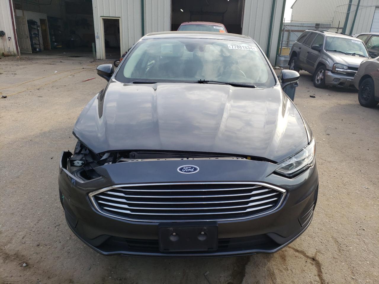 2019 Ford Fusion VIN 3FA6P0HD1KR199663 Copart auction photo, front end / side damage thumbnail 5